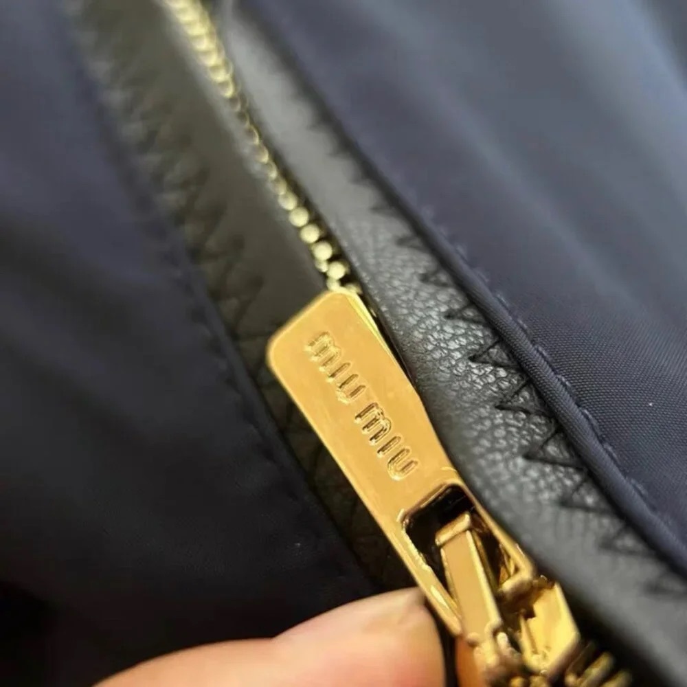 MIUMIU windbreaker, exquisitely tailored with a hood - Picture 4 of 4